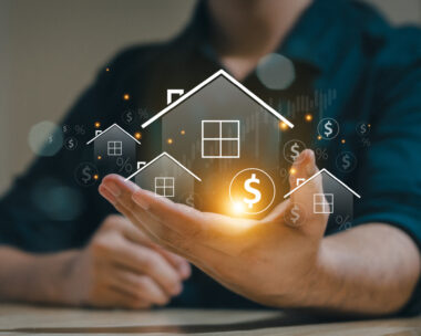 Real estate concept business, home insurance and real estate protection. Real estate investment concept. Buy and sell houses and real estate online on a virtual screen.