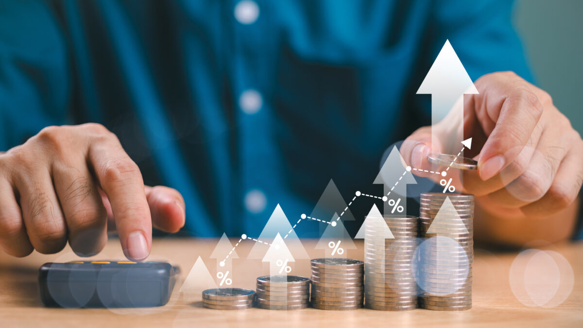 Money interest rate increase concept, percentage commission credit. Grow up stock risk management. Bank policy price raise. Businessman with coin, calculate high percentage of company profit dividend