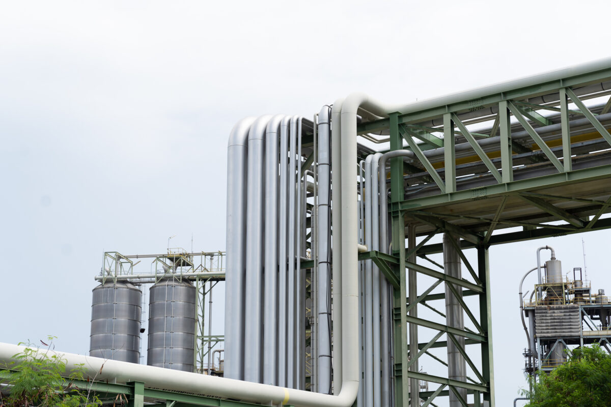 Gas interconnector. Pipeline for natural gas. Natural gas separation plant. Petroleum refinery piping network system. Network of pipes, valves, pumps, mechanisms deliver natural gas