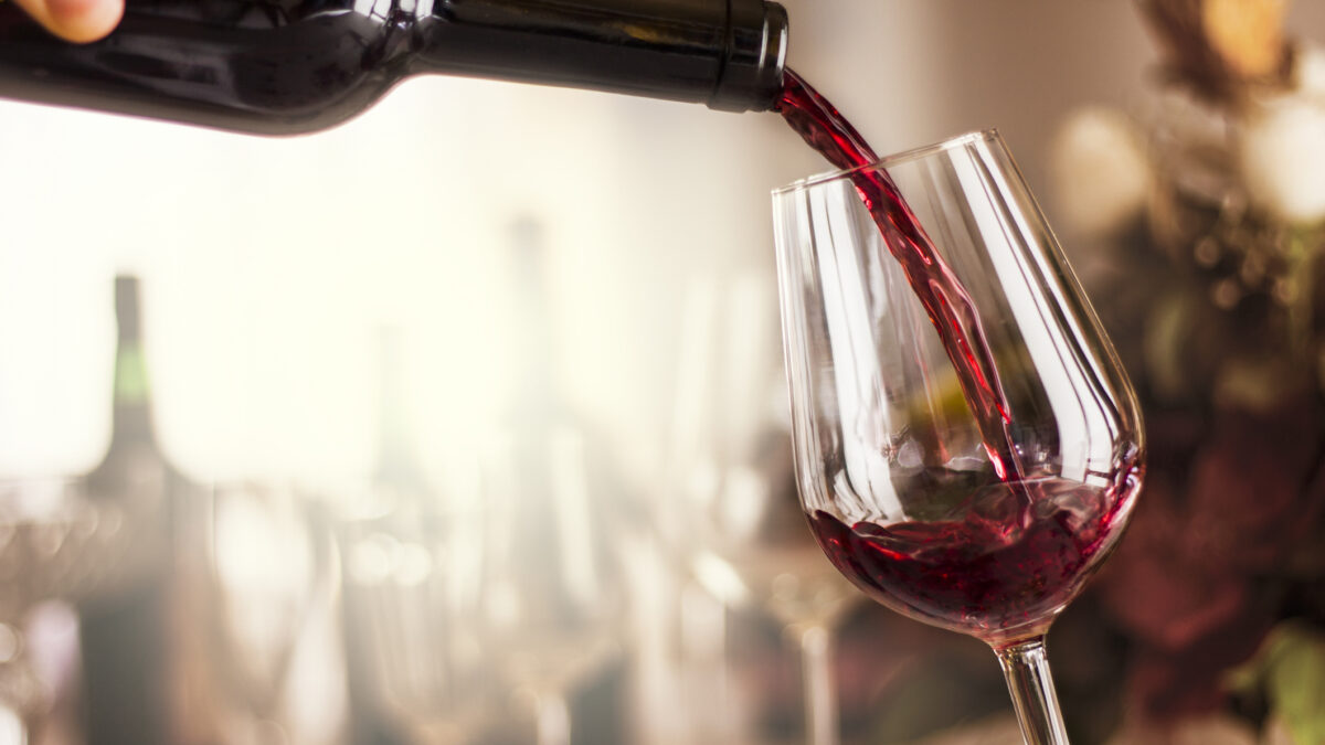 red wine pouring in a restaurant