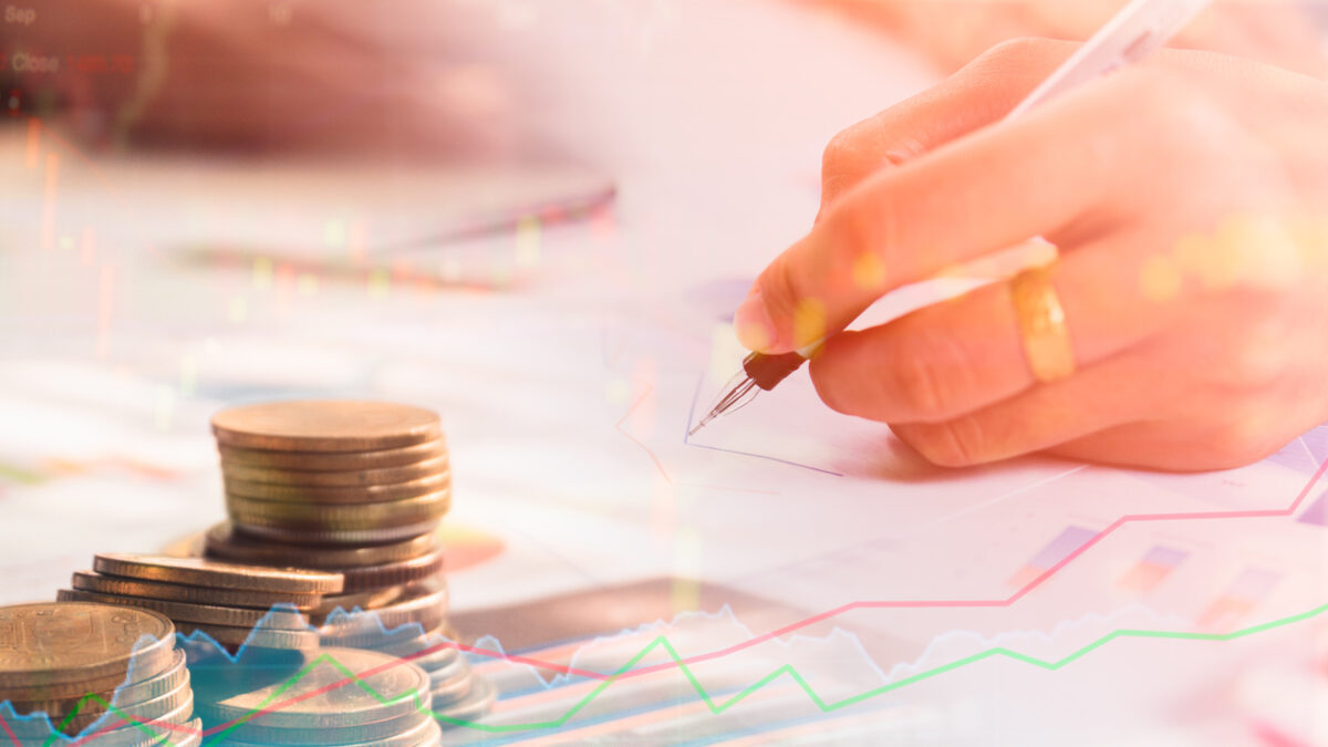 Stack coin money with report finance and banking with profit yong businessmen calculate about cost and stock market or forex graph.