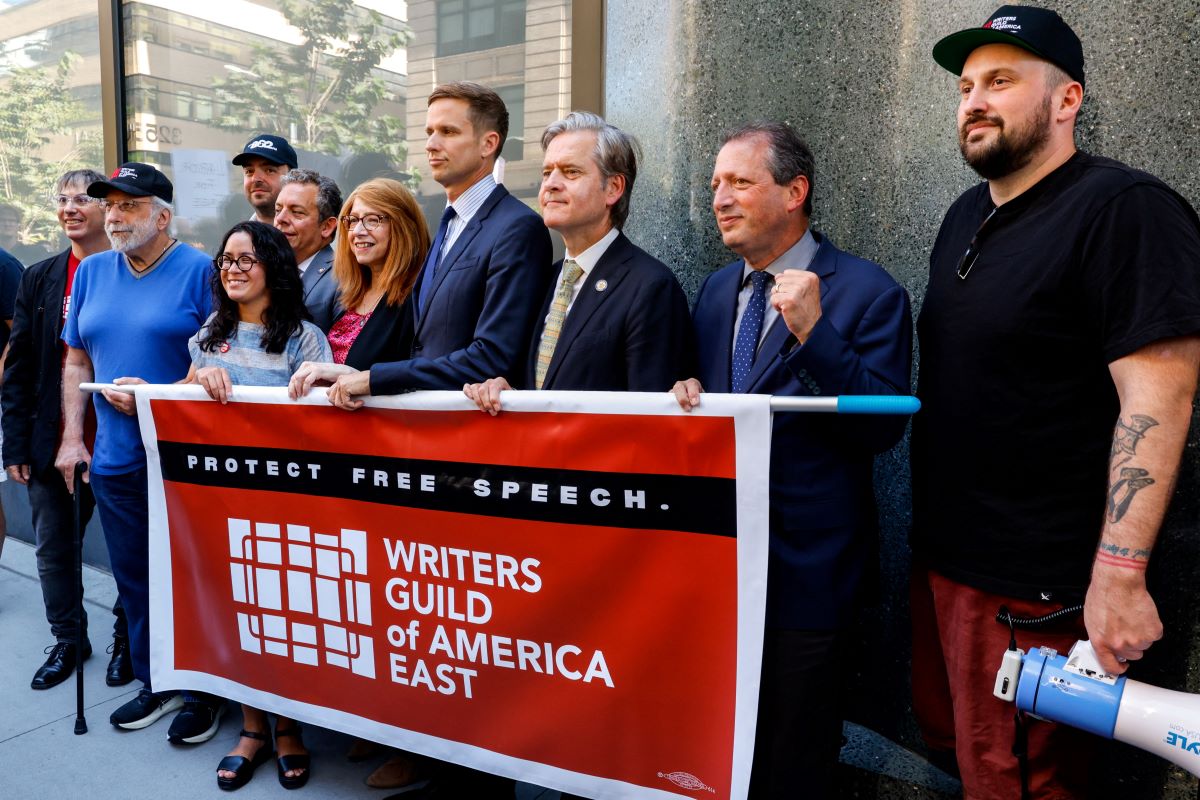 Politicians and members of Writers Guild of America East outside ABC's studios