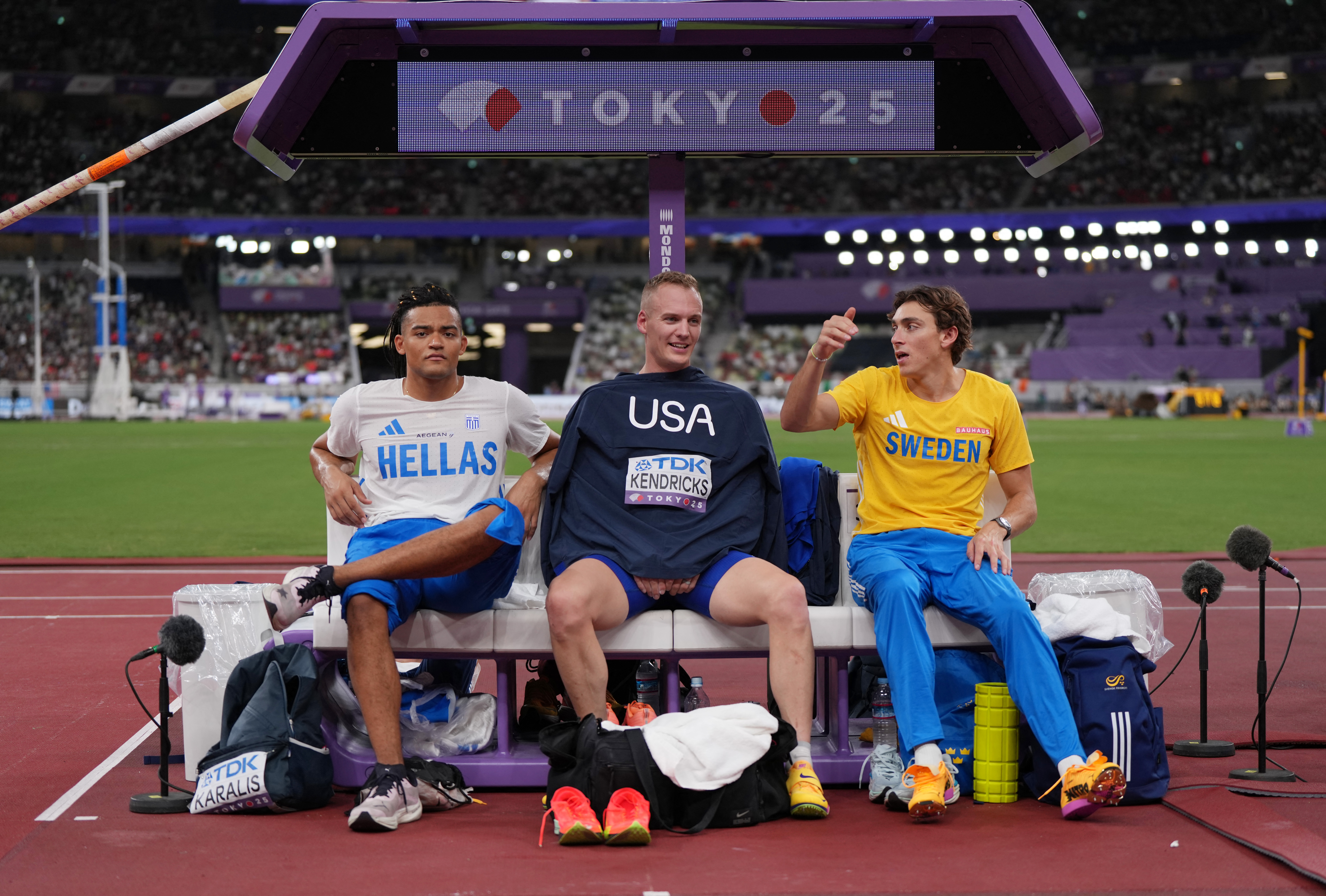 World Athletics Championships Tokyo 2025 - Men's Pole Vault Final - Japan National Stadium, Tokyo, Japan - September 15, 2025 Sweden's Armand Duplantis, Greece's Emmanouil Karalis and Sam Kendricks of the U.S. before the final REUTERS/Aleksandra Szmigiel