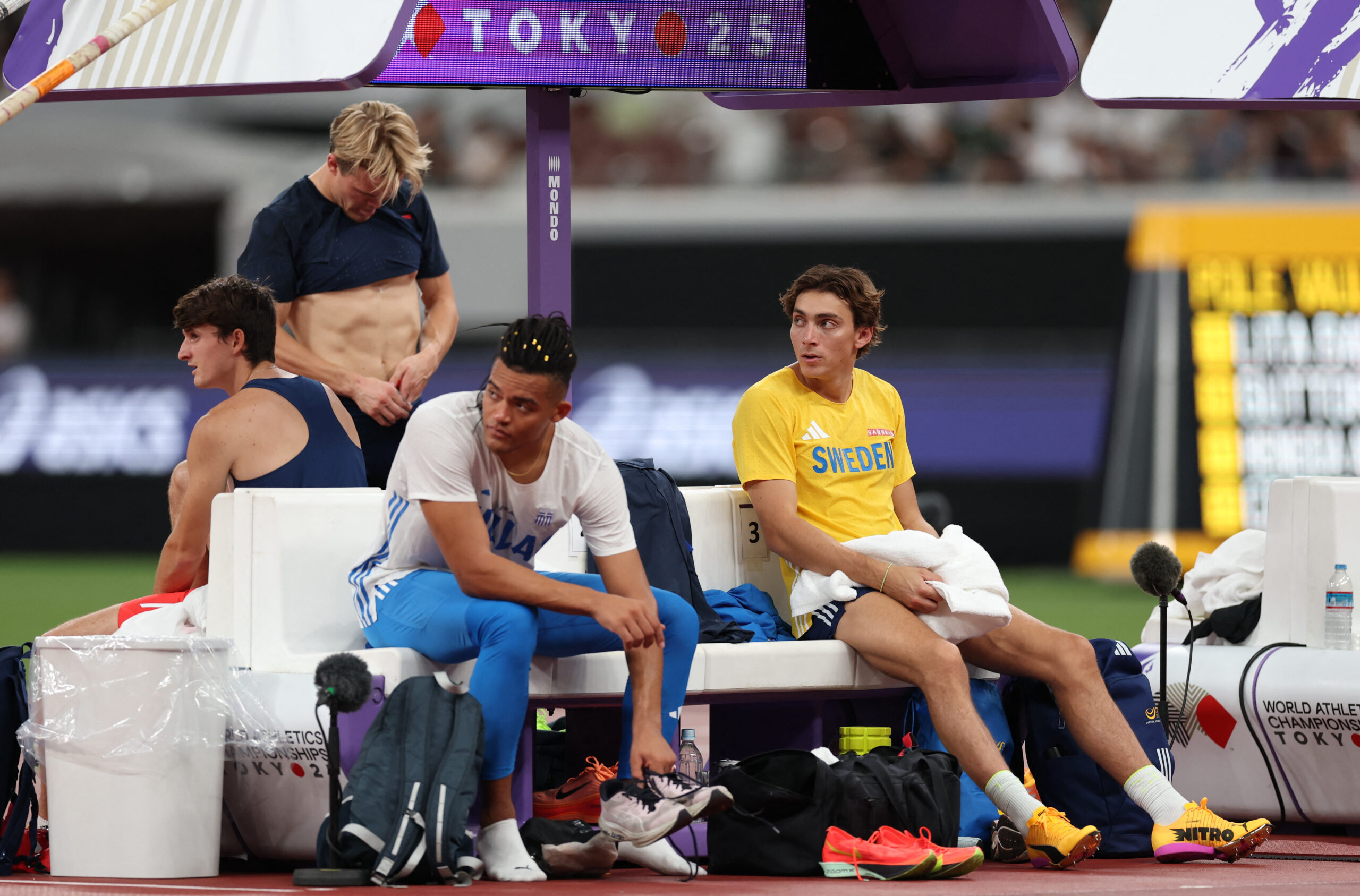 World Athletics Championships Tokyo 2025 - Men's Pole Vault Final - Japan National Stadium, Tokyo, Japan - September 15, 2025 Greece's Emmanouil Karalis and Sweden's Armand Duplantis before the start of the final REUTERS/Issei Kato
