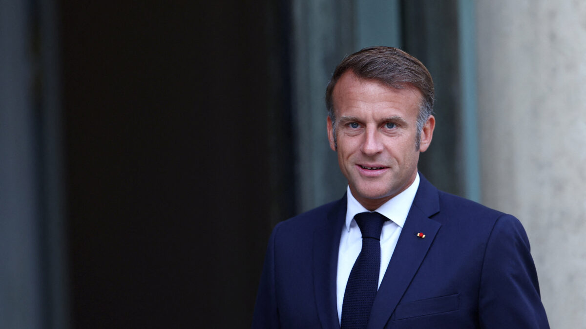 French President Emmanuel Macron welcomes a guest at the Elysee Palace in Paris, France, August 27, 2025. REUTERS