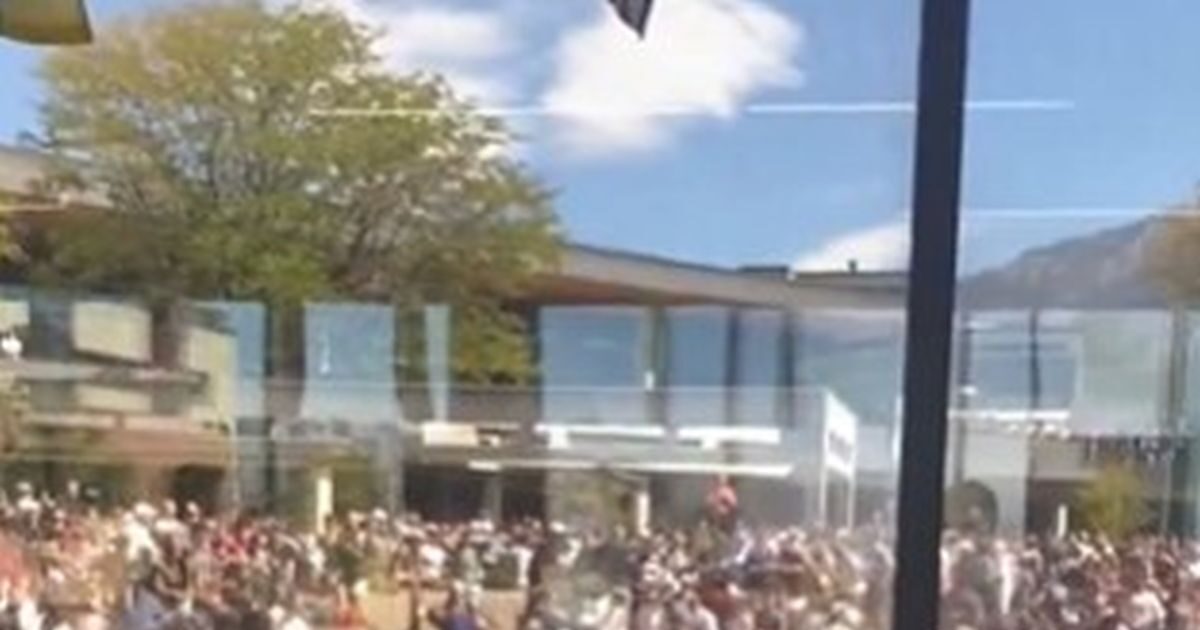 Charlie Kirk: Video shows a man running on a nearby roof after the murder of