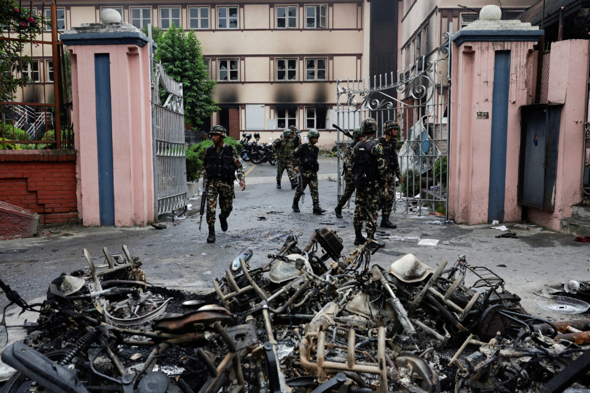 Nepali Army soldiers patrol near the Supreme Court during a curfew following protests against Monday's killing of 19 people after anti-corruption protests triggered by a social media ban which was later lifted, in Kathmandu, Nepal, September 10, 2025. REUTERS