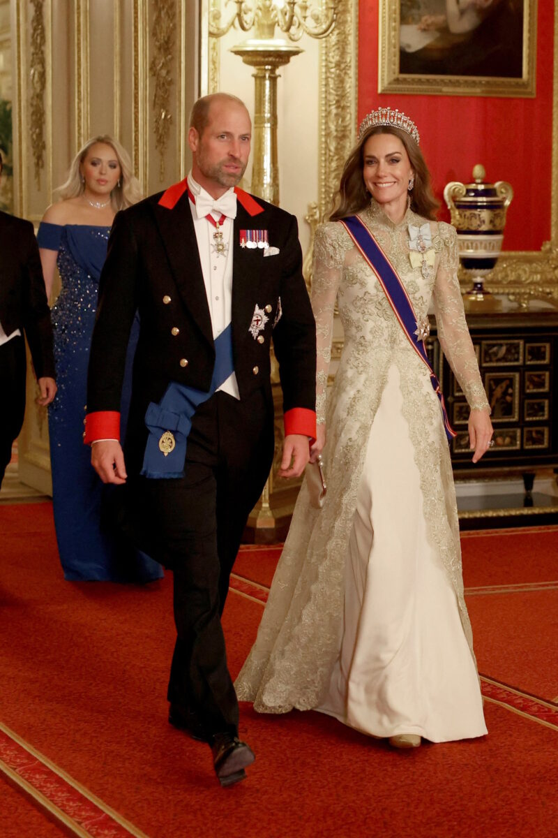 Britain's William, Prince of Wales and Catherine, Princess of Wales walk to attend the State Banquet during U.S. President Donald Trump's state visit, at Windsor Castle, in Windsor, Britain, September 17, 2025. REUTERS