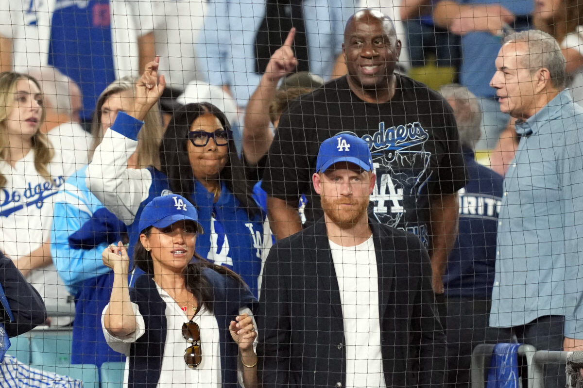 Oct 28, 2025; Los Angeles, California, USA; Prince Harry (right) and Meghan Markle (left) watch in the seventh inning between the Toronto Blue Jays and the Los Angeles Dodgers during game four of the 2025 MLB World Series at Dodger Stadium. Mandatory Credit: Kirby Lee-Imagn Images