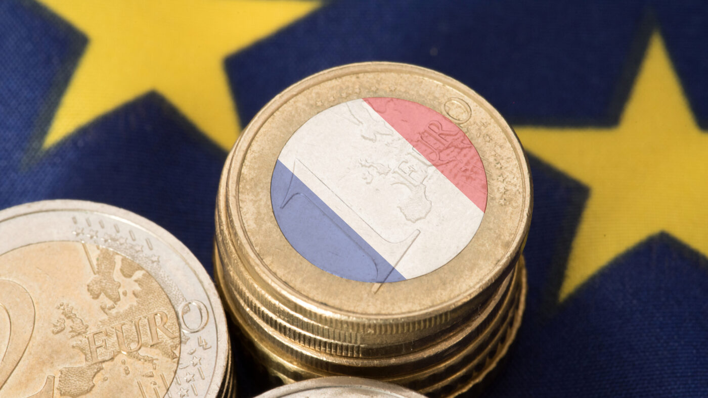 Flag of France and the European Union EU and euro coins
