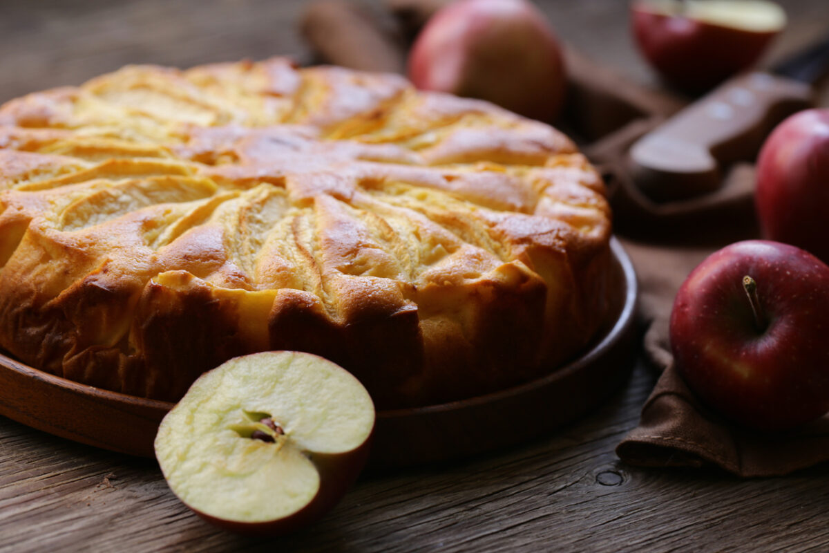 homemade fresh apple pie on a wooden plate