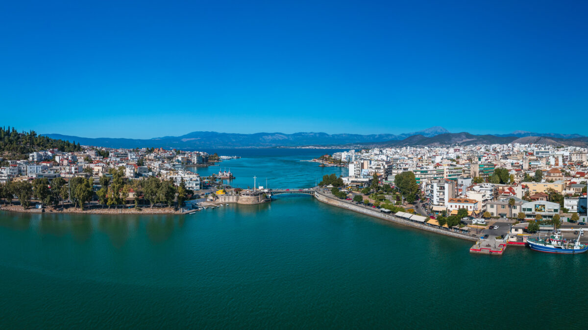 Aerial panoramic photo of the old bridge and the city center of Halkida, Chalkida in Evia, Greece