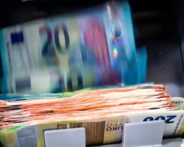 The Euro Currency Banknotes In A Currency Counting Machine.