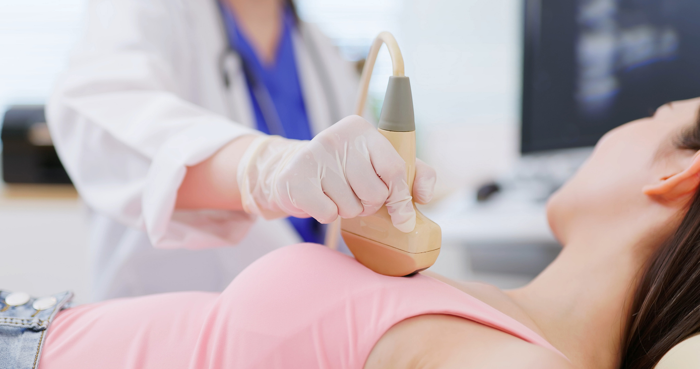 close up of asian doctor using ultrasound scanner