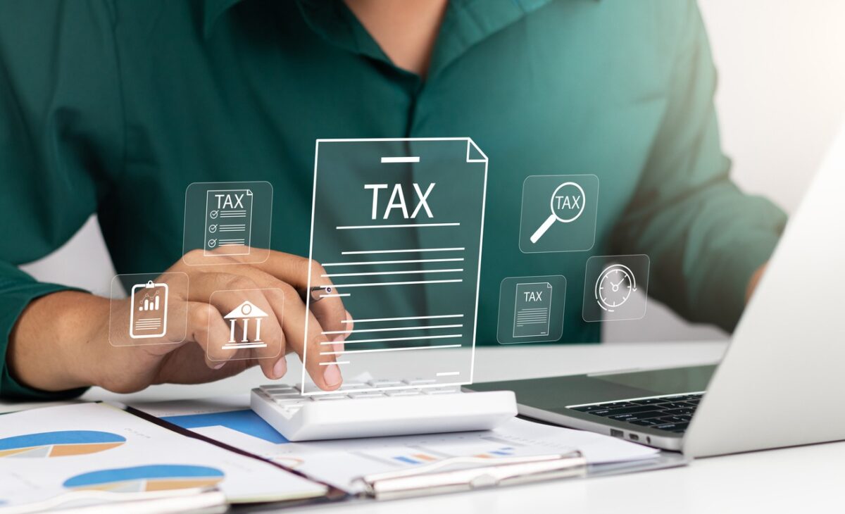 Corporate and individual tax payment concept, Businessman filing taxes on laptop financial planning and Corporate tax, Income tax return and VAT calculation government revenue and taxation concept