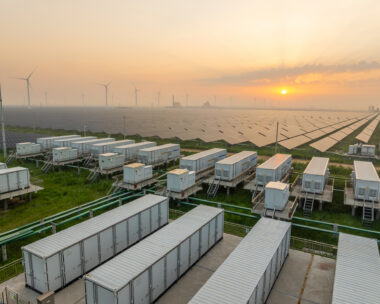 Energy storage power station, solar power station and wind power station at sunrise