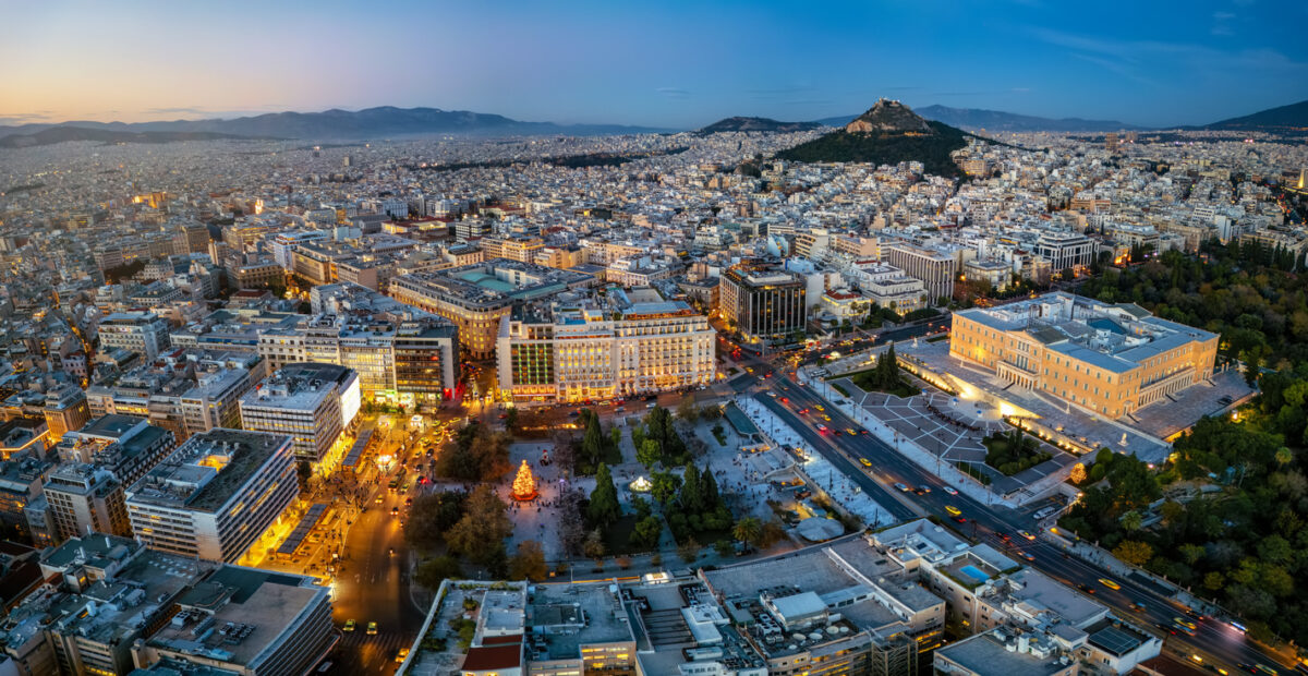 Panoramic aerial view of the Christmas decorated city center of Athens, Greece, with Syntagma Square