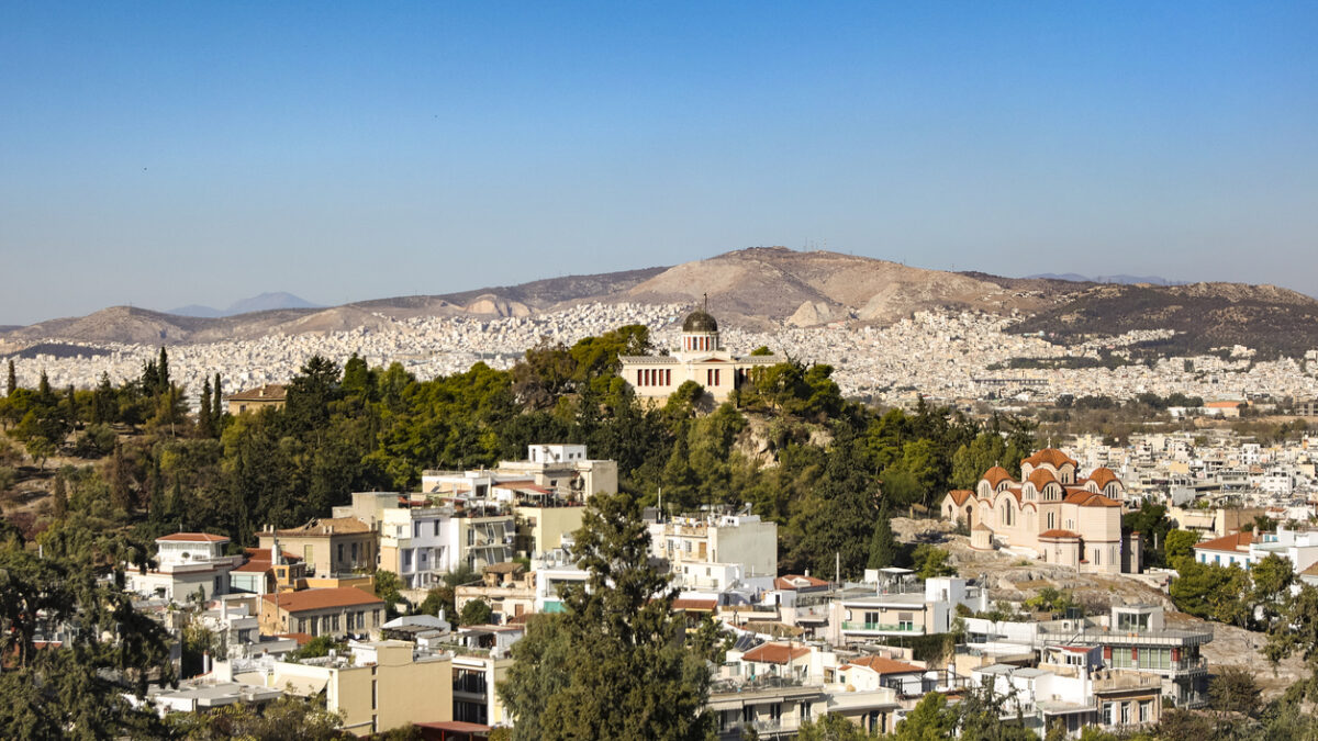 High angle view of National Observatory of Athens (Thissio Visitor Center) and Church of Agia Marina in Athens, Greece.
