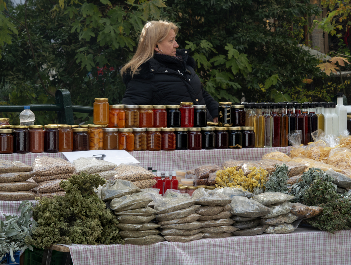 A saleswoman of handmade goods in the tourist village of Steni on the island of Evia (Euboea) in Greece