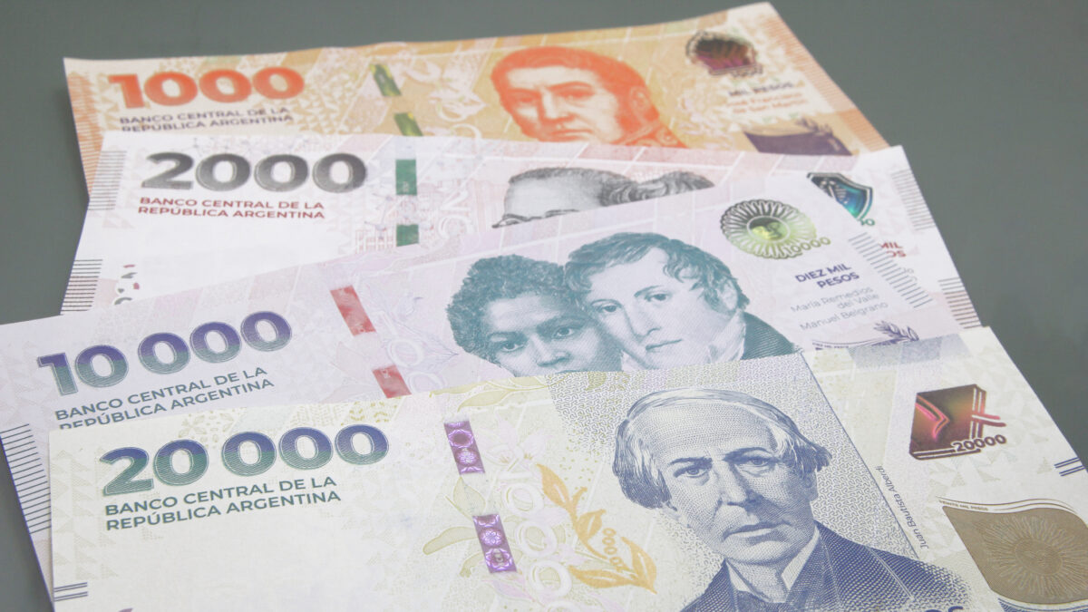 Stack of several Argentine pesos banknotes
