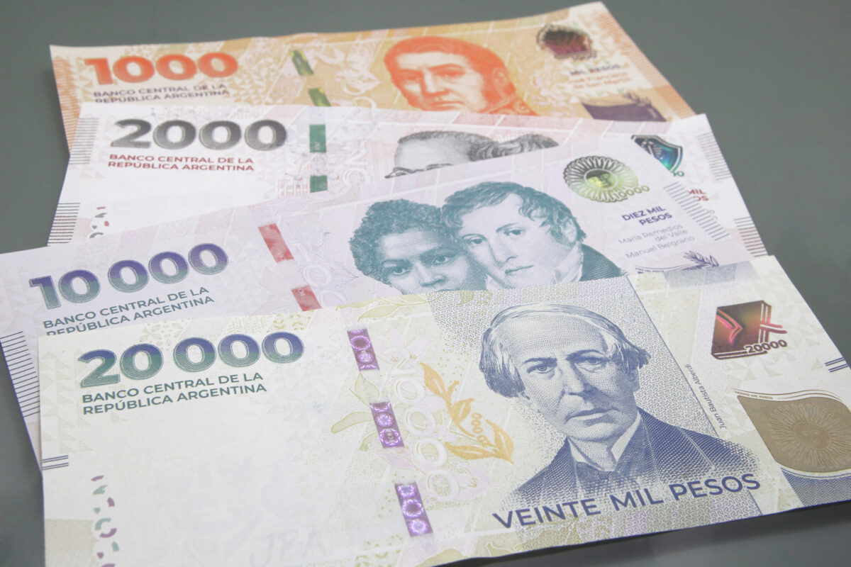 Stack of several Argentine pesos banknotes