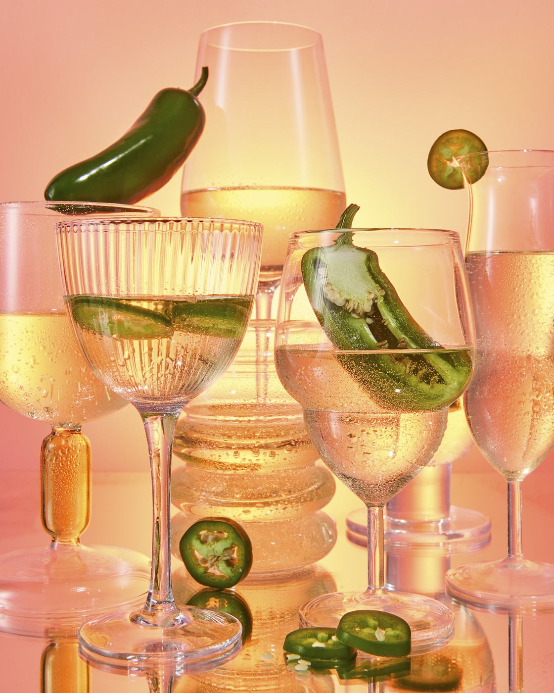 Jalapenos inside a glass of sauvignon blanc wine