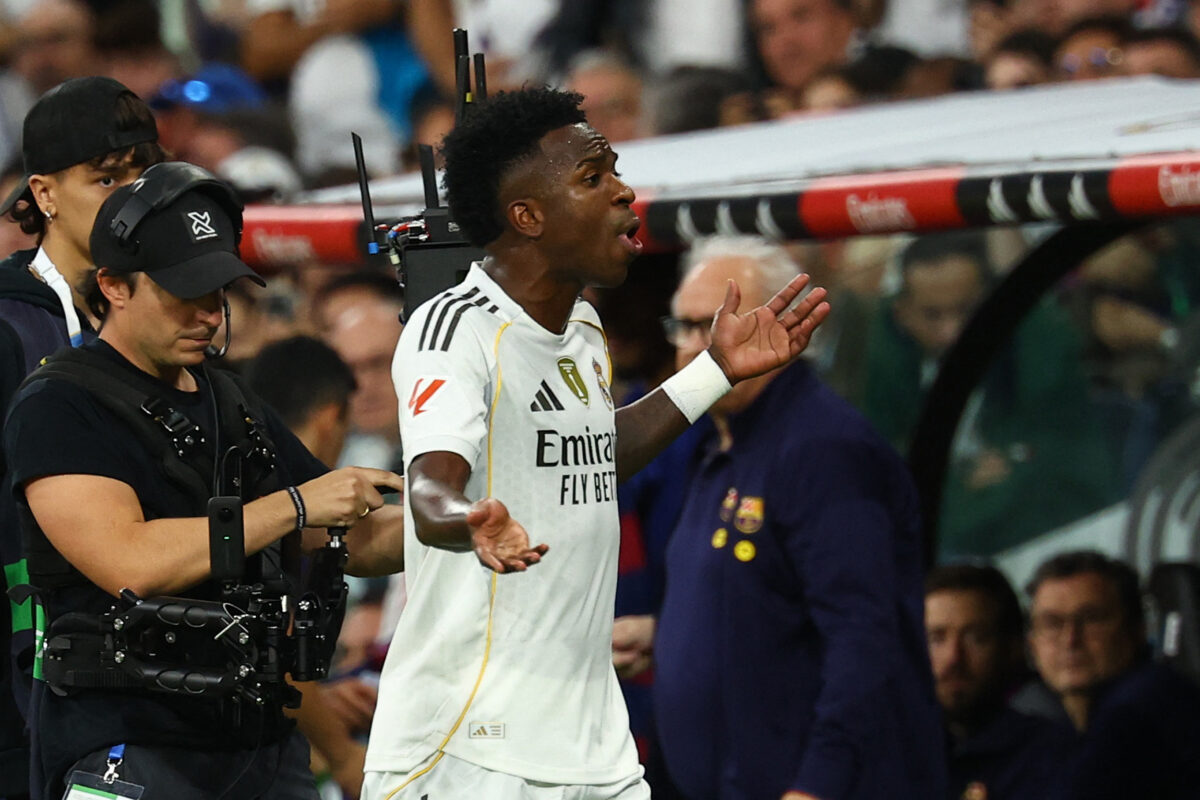 Soccer Football - LaLiga - Real Madrid v FC Barcelona - Santiago Bernabeu, Madrid, Spain - October 26, 2025 Real Madrid's Vinicius Junior reacts after being substituted REUTERS