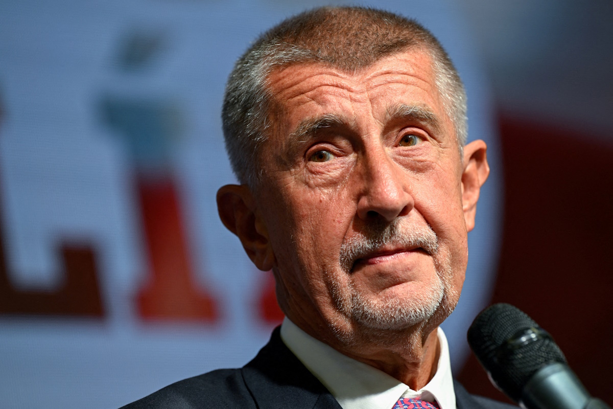 FILE PHOTO: Leader of ANO party Andrej Babis looks on as he speaks during a press conference after the preliminary results of the parliamentary election, at the party's election headquarters in Prague, Czech Republic, October 4, 2025.