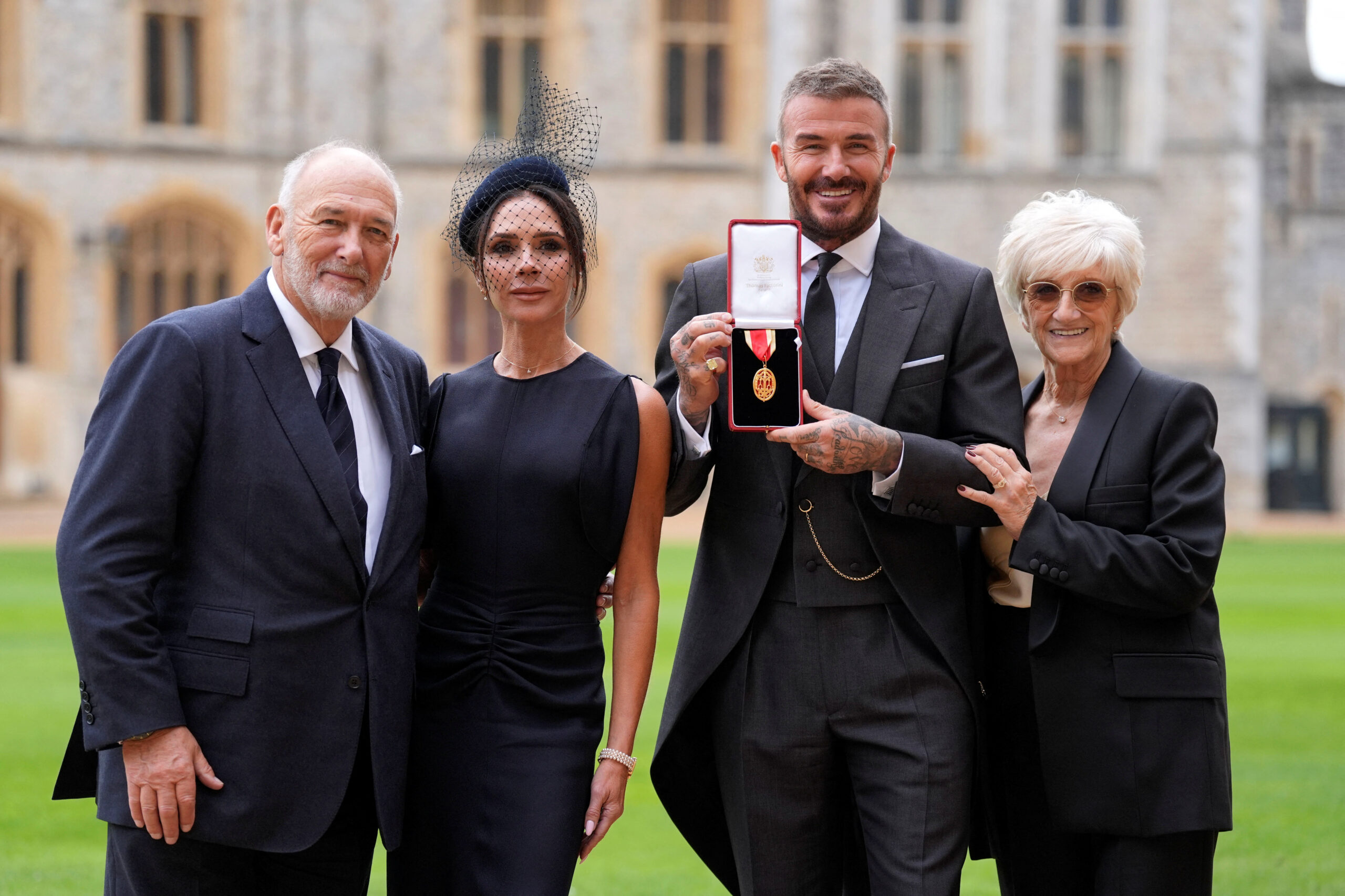 Sir David Beckham, with his wife Lady Victoria and parents Ted and Sandra Beckham, after he was made a Knight Bachelor at an investiture ceremony at Windsor Castle, Berkshire. November 4, 2025. Andrew Matthews