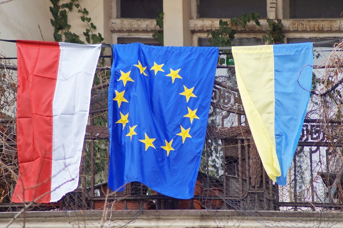 The flags of Ukraine, Poland and the European Union, the EU were hung on their balcony by Ukrainian refugees and patriots as a token of gratitude for their help and support in the struggle and hope for a speedy resolution of the conflict and peace on earth