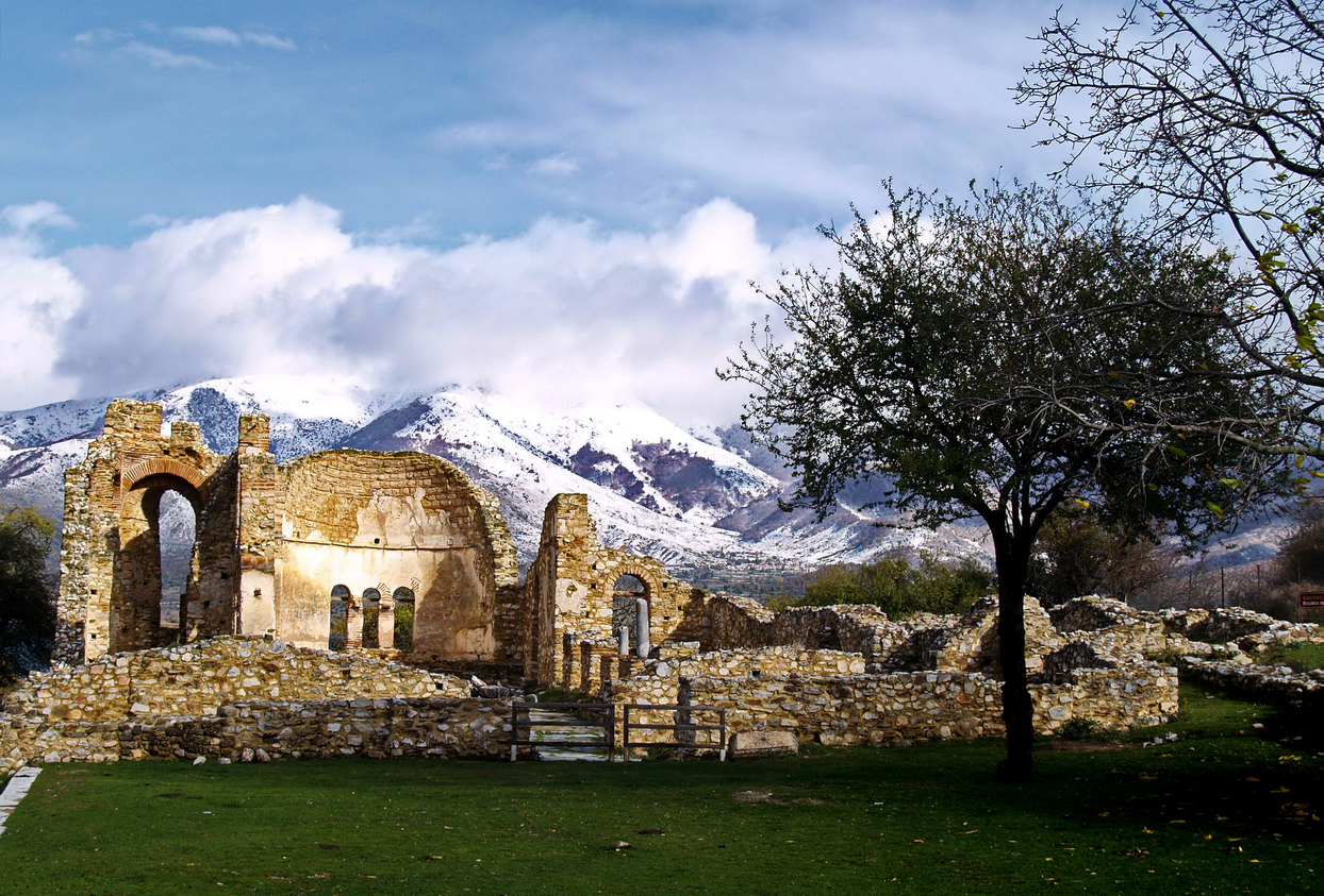 Ruins of the byzantine basilica of Agios Achilios (or Axileios, or Achilles), built on 10th century BC in Small Prespa lake in Northern Greece, in a cloudy winter day.