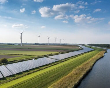 Solar panels and wind turbines generating renewable energy for green and sustainable future.