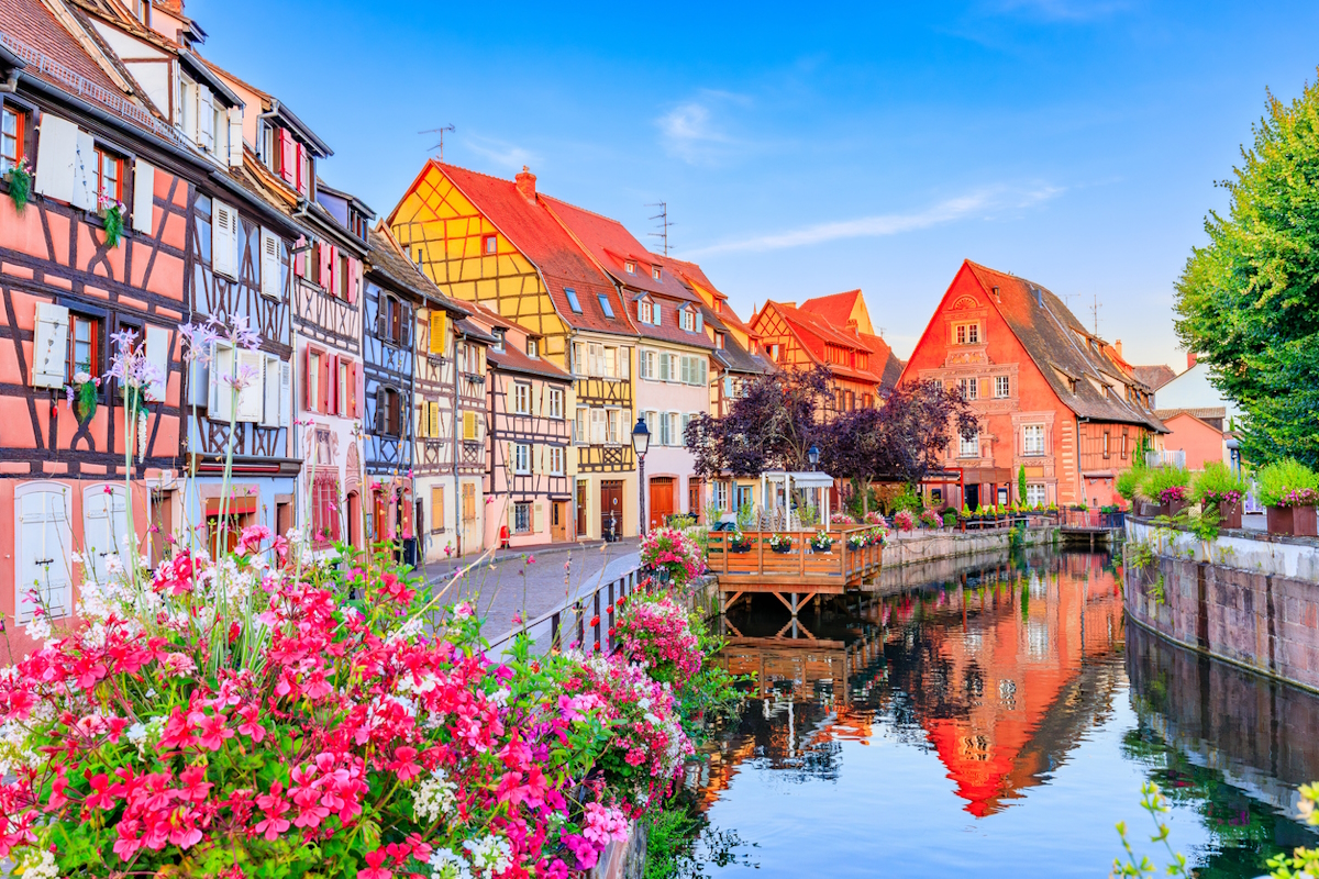 Colmar, Alsace, France. Petite Venice, water canal and traditional half timbered houses.