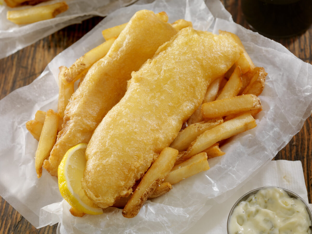 Beer Battered Fish and Chips with Tarter Sauce in a take out box - Photographed on Hasselblad H3D2-39mb Camera