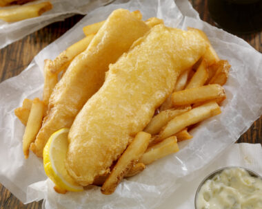 Beer Battered Fish and Chips with Tarter Sauce in a take out box - Photographed on Hasselblad H3D2-39mb Camera