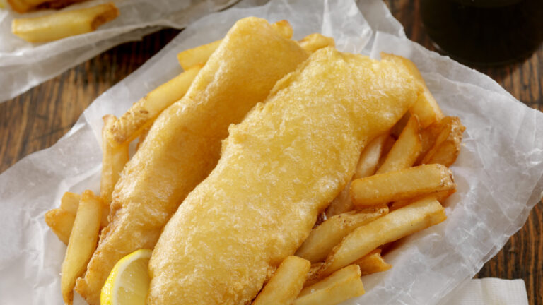 Beer Battered Fish and Chips with Tarter Sauce in a take out box - Photographed on Hasselblad H3D2-39mb Camera
