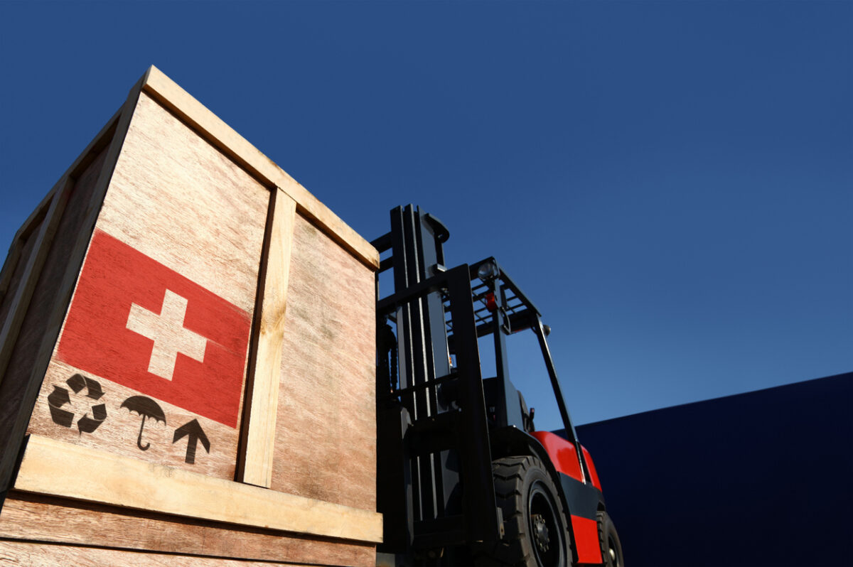 Forklift truck with boxes on pallet. Import export cargo concept