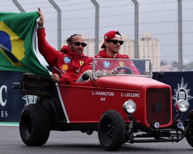 Formula One F1 - Sao Paulo Grand Prix Ferrari's Lewis Hamilton holds a Brazil flag with Ferrari's Charles Leclerc