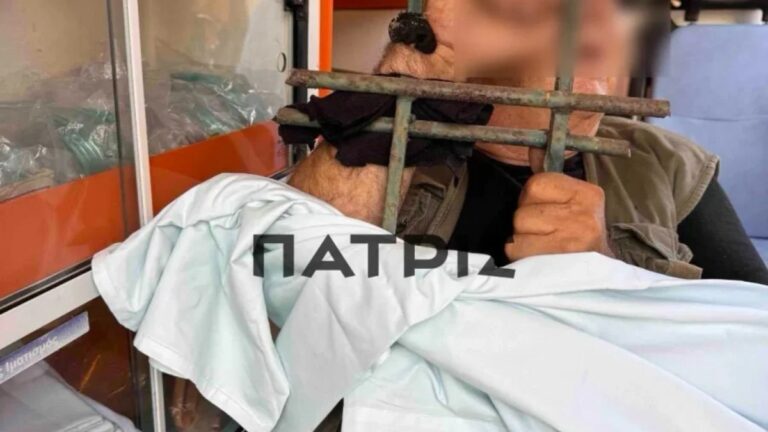 Σίδερο καρφωμένο σε χέρι άνδρα