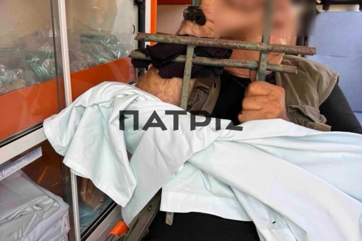 Σίδερο καρφωμένο σε χέρι άνδρα