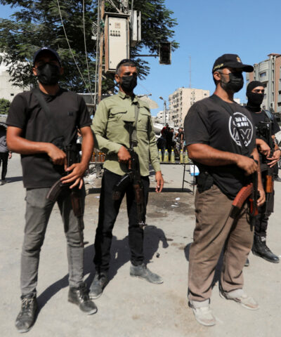 Hamas police officers stand guard, amid a ceasefire between Israel and Hamas, in Gaza City, October 11, 2025. REUTERS