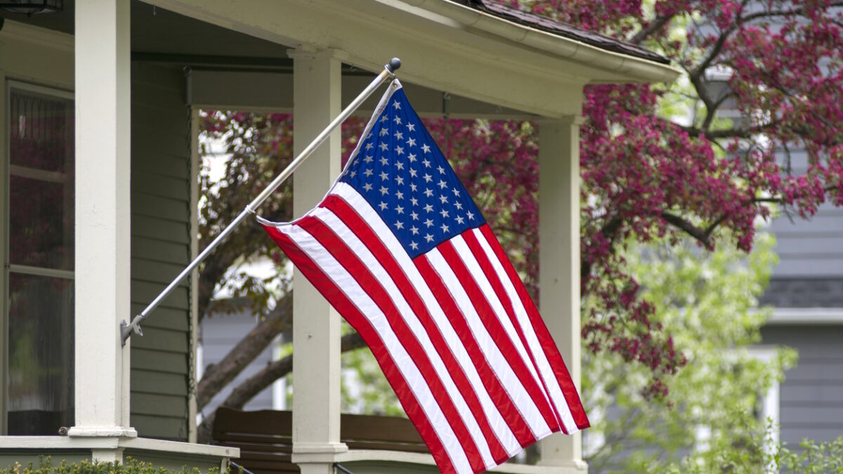 An American household has decided to mount their nations flag outside.