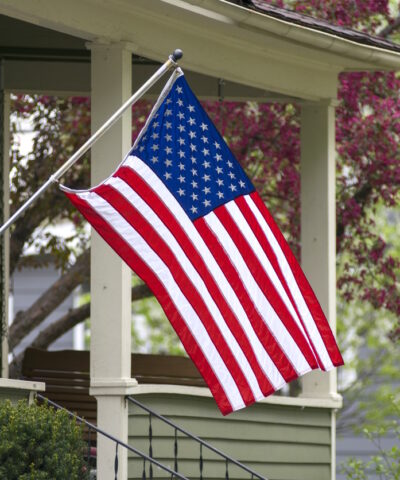An American household has decided to mount their nations flag outside.
