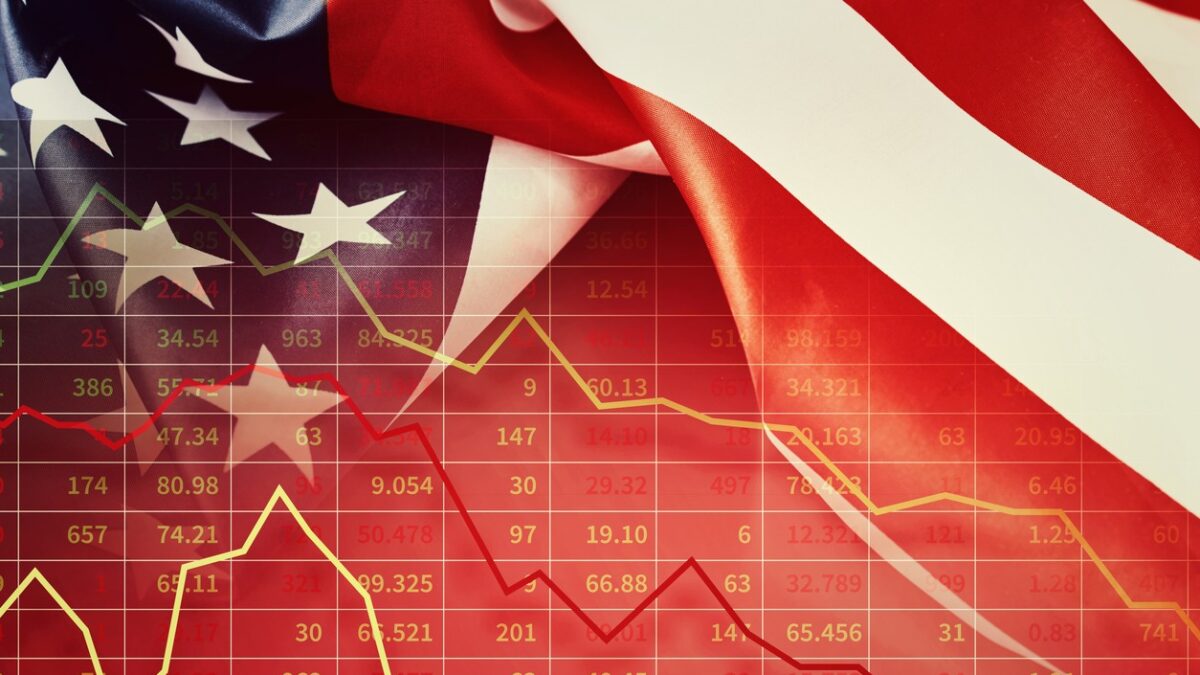 Global economic and financial crisis concept. Stock market charts and american flag
