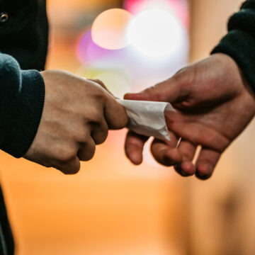 Addict young man have meeting with dealer at night to buy dose of white powder cocaine.