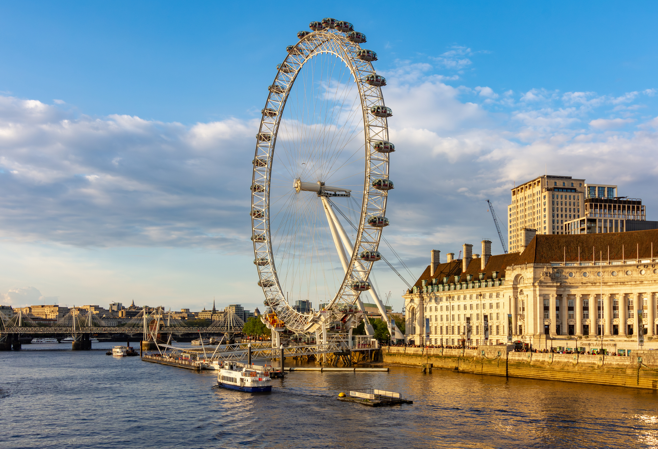London, UK - 04 May 2024: London Eye (Millennium Wheel) along Thames river