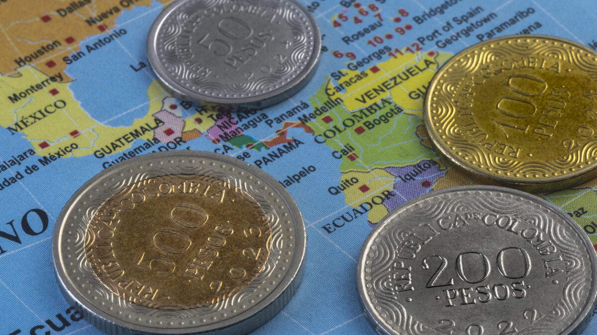 Colombian coins on a map of America