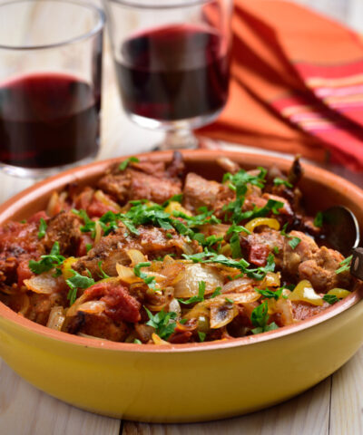 Rabbit stew a basque with onion, pepper, and parsley