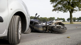 Motorbike Accident on the road with a car