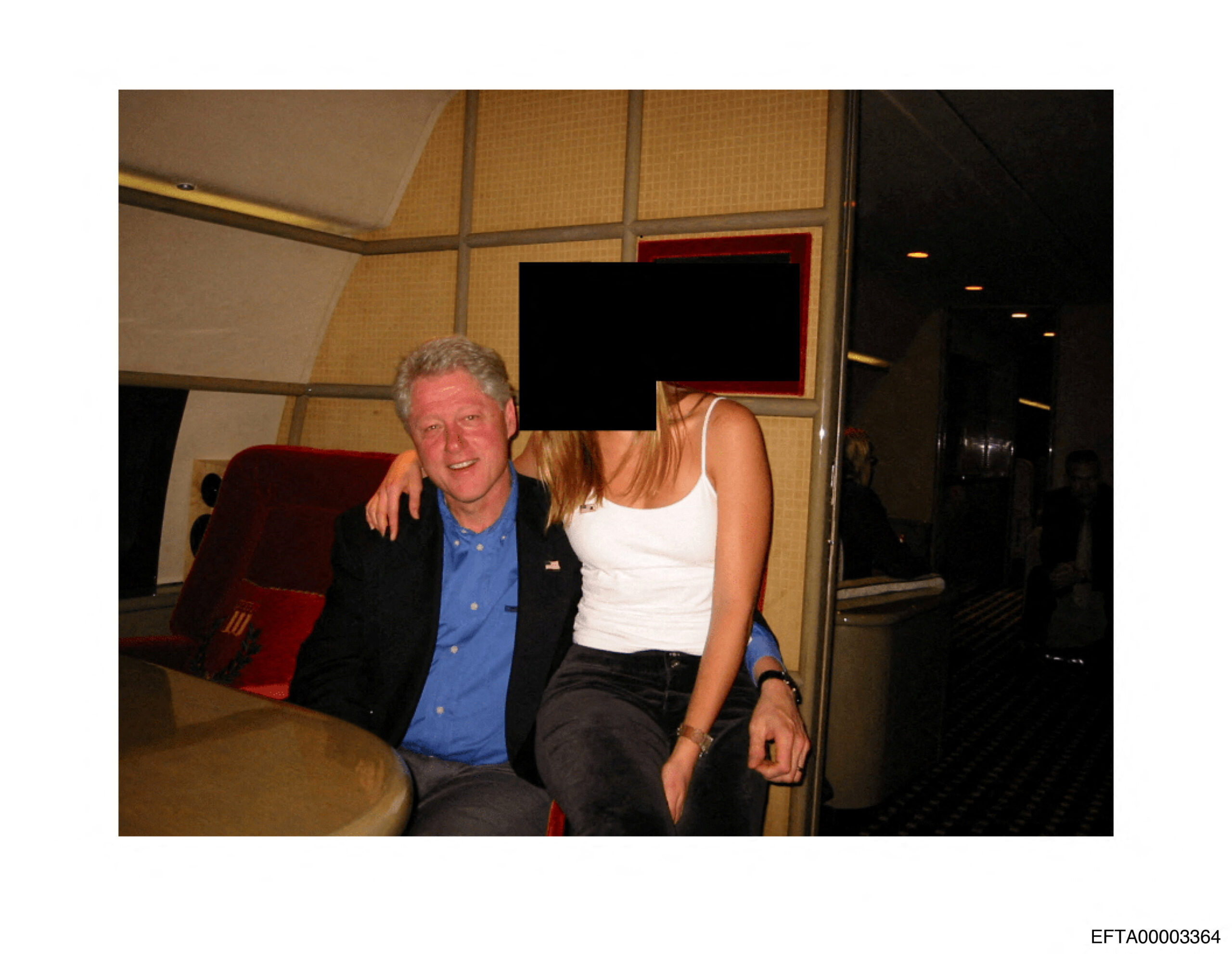 Former U.S. President Bill Clinton and a woman are seen in this image from the estate of late financier and convicted sex offender Jeffrey Epstein, released by the Department of Justice in Washington, D.C., U.S., on December 19, 2025. U.S. Justice Department